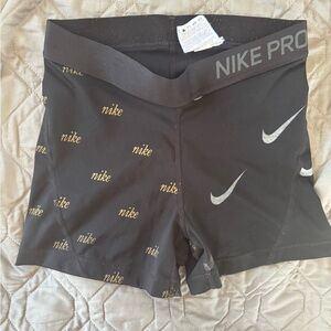 Nike Women's Black and Gold Athletic Shorts